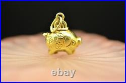 14K Yellow Gold hollow pig piggy bank pendant charm with half inserted coin