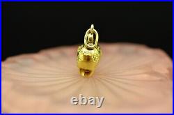 14K Yellow Gold hollow pig piggy bank pendant charm with half inserted coin