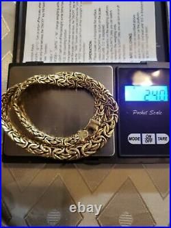 14k gold chain + 22k gold coin