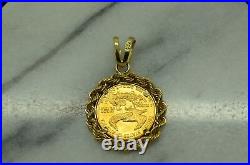 1/10th Oz 1989 $5 Gold American Eagle Coin In A 14k Yellow Gold Rope Bezel