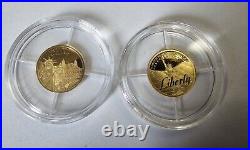 585 14k Yellow Gold Symbol of Freedom Coins 1g total weight of both (2)