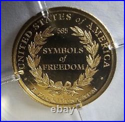 585 14k Yellow Gold Symbol of Freedom Coins 1g total weight of both (2)