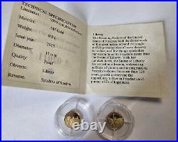 585 14k Yellow Gold Symbol of Freedom Coins 1g total weight of both (2)