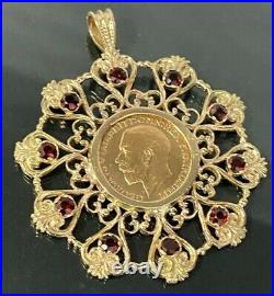 A 22CT gold 1912 full Sovereign Coin Large Pendant with Garnet 22.33g/ 64mm