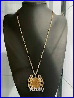 A 22CT gold 2001 full Sovereign Coin Pendant with Garnet on 9ct solid gold Chain