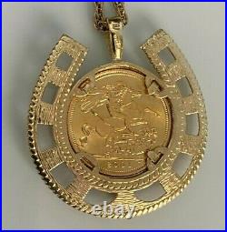 A 22CT gold 2001 full Sovereign Coin Pendant with Garnet on 9ct solid gold Chain