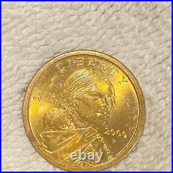 Gold one dollar coin