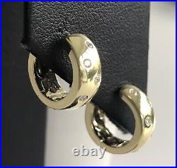 New Authentic Roberto Coin 18kt yellow gold huggy diamond 0.14 ct wrap earrings